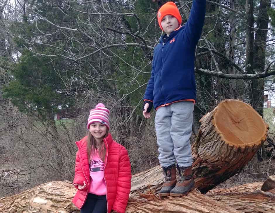 Children on Logs for Custom Millwork in Princeton Lumber Mill